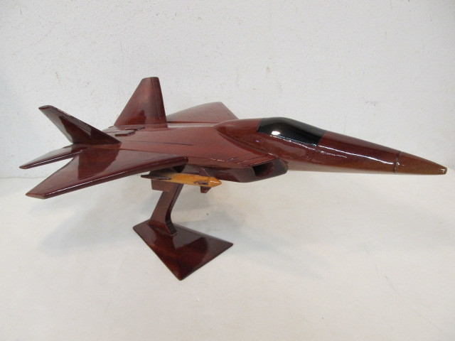 lot 15 image: Large Solid Wood Fighter Jet Display on Stand