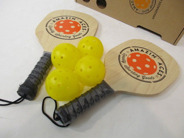 lot 57 image: Brand New Amazin Aces PICKLE BALL Set