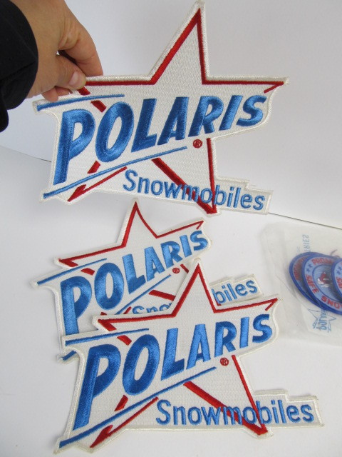 lot 259 image: Large Lot of NOS Vintage 70s POLARIS Patches Stickers Pins etc.