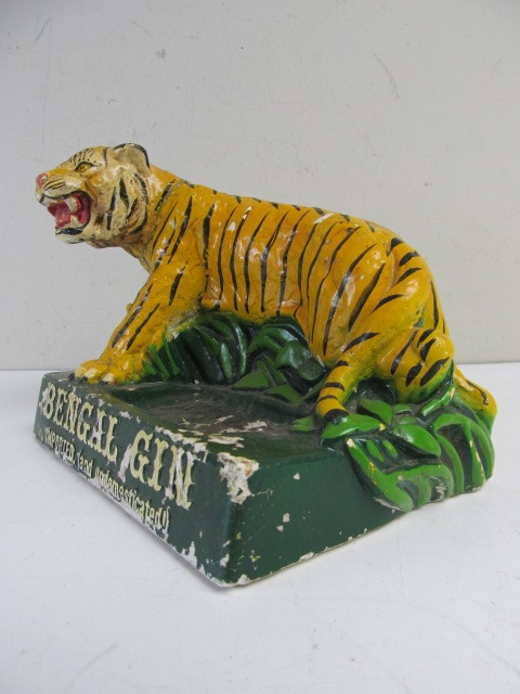 Lot - Vintage Bengal Gin tiger chalk ware advertisement.