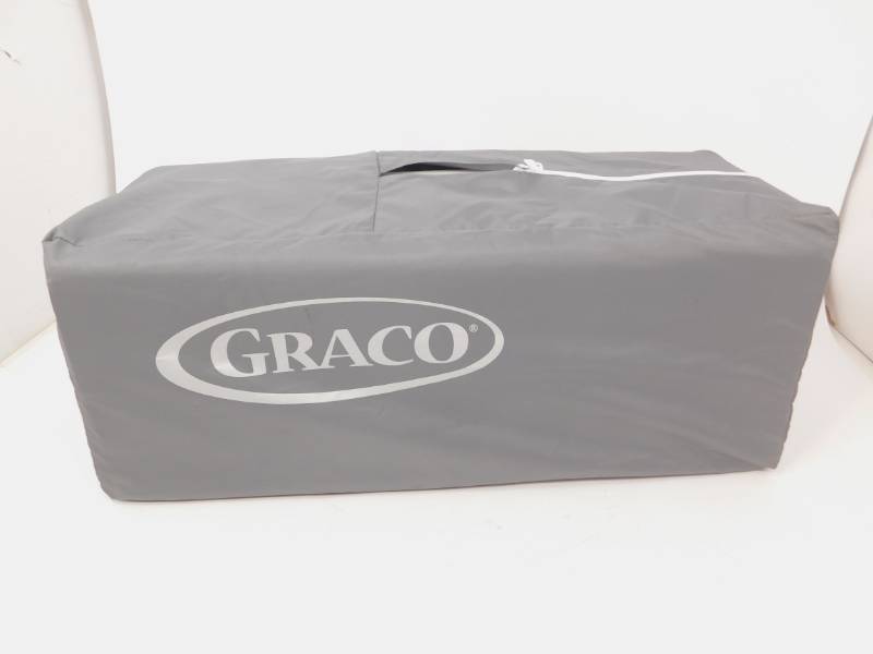 lot 7 image: New Graco Pack and Play