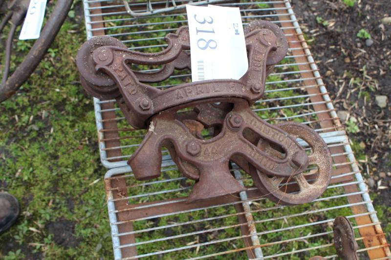 lot 318 image: Old Metal Pulleys