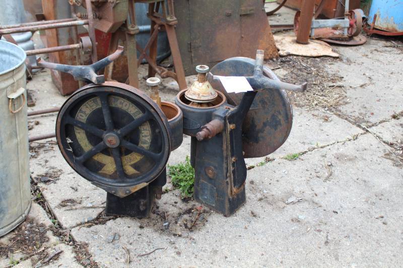 lot 379 image: Lot of (2) Metal Cream Seperator Bottoms