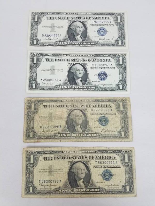 lot 21 image: Lot of 4 U.S. Silver Dollar Certificate 2x 1957 & 2x 1957 B