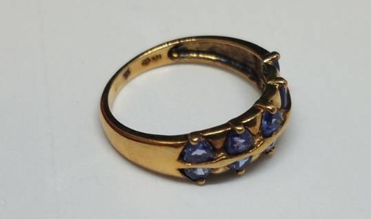 lot 32 image: 10 karat gold ring with blue gems