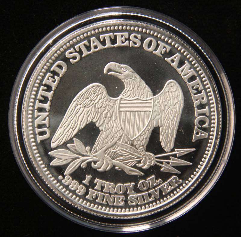 lot 08 image: 1 TROY OZ. .999 FINE SILVER EARLY DOLLAR DESIGN IN AIRTITE