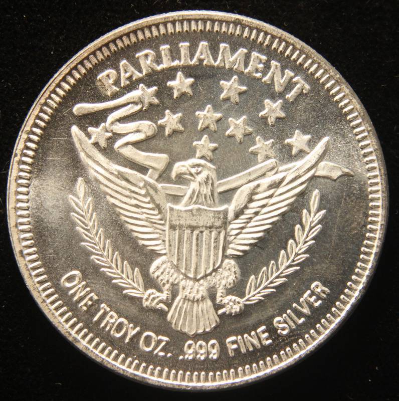 lot 64 image: 1 TROY OZ. .999 FINE SILVER MORGAN DOLLAR DESIGN