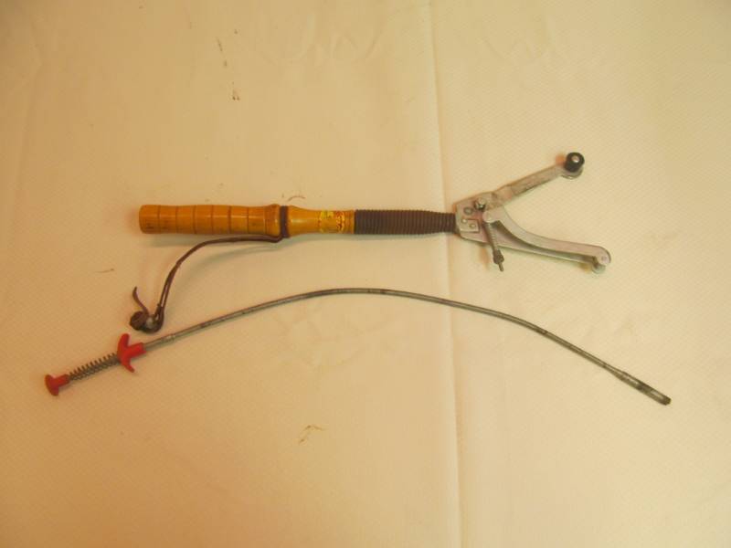 lot 94 image: Winchester clay pigeon thrower, grabber tool