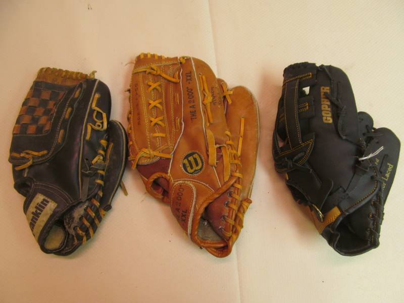 lot 144 image: Baseball gloves