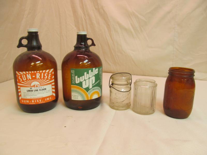 lot 172 image: vintage glass jugs, jars