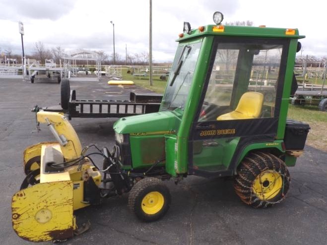 lot 16 image: 1996 John Deere 425 with Snowblower and Cab