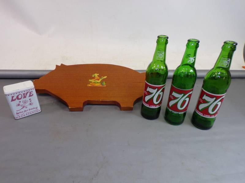 lot 58 image: Wood Pig Board, American 76 Green pop bottles, Love spice tin