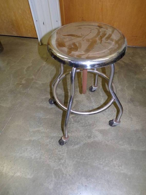 lot 94 image: Metal rolling stool