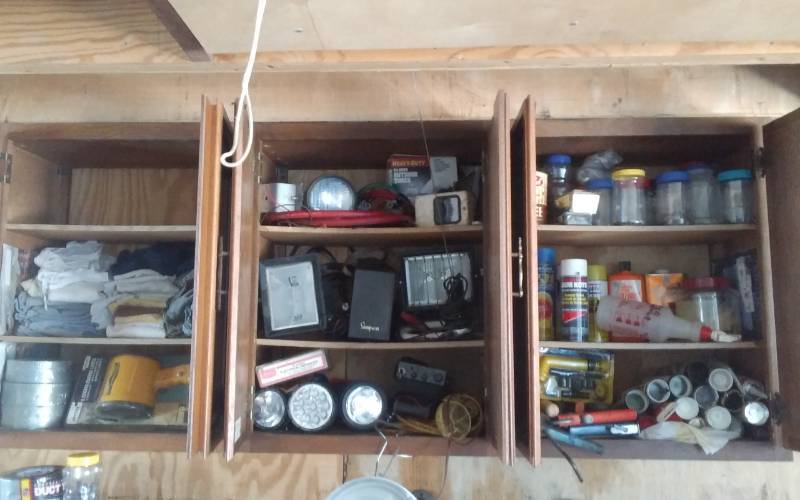 lot 20 image: Contents Of 3-Cupboards (Work Lights, Flashlights, Duct Tape, Hardware)