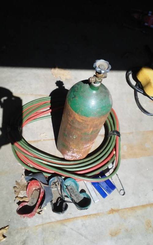 lot 62 image: Oxygen Tank, Torch Hose, Tip Cleaners, Igniter, Googles