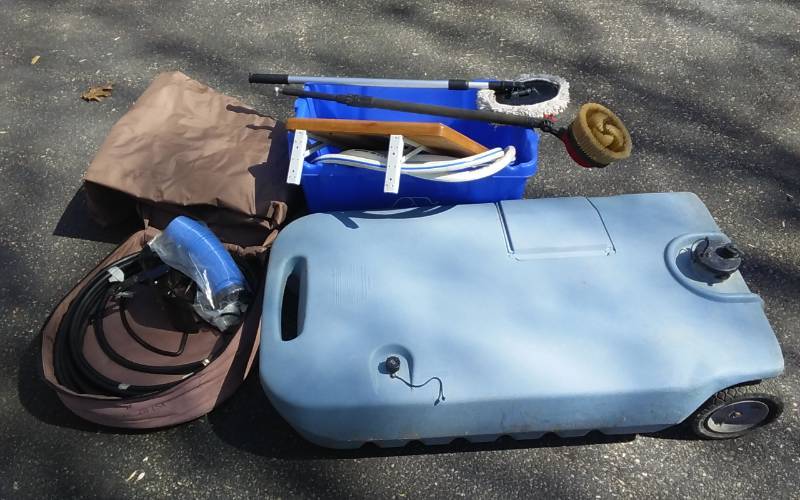 lot 75 image: RV & Camper Related New & Other Hoses, Portable Waste Tank, Inflatable Mattress, Telescoping Brushes, Shelf