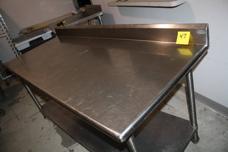 6 portable stainless steel table with backsplash and undershelfon Casters