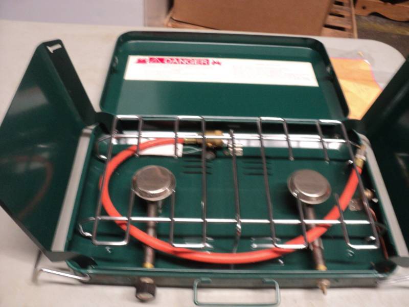 lot 26 image: Camping Stove looks new...