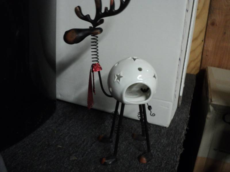 lot 53 image: Moose Candle Holder...