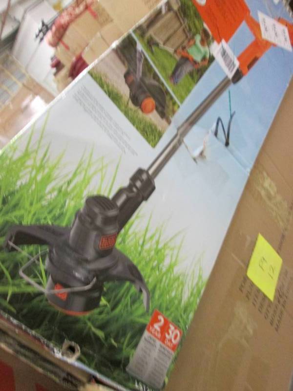 lot 13 image: 20-Volt String TrimmerEdger by Bla...