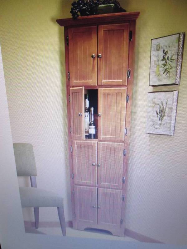 lot 15 image: 8-Door Corner Cabinet open box Reta...