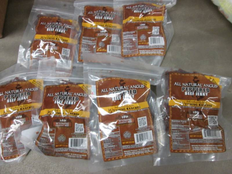 lot 233 image: 7- 3.5 oz Packs Peppered Beef Jerky...