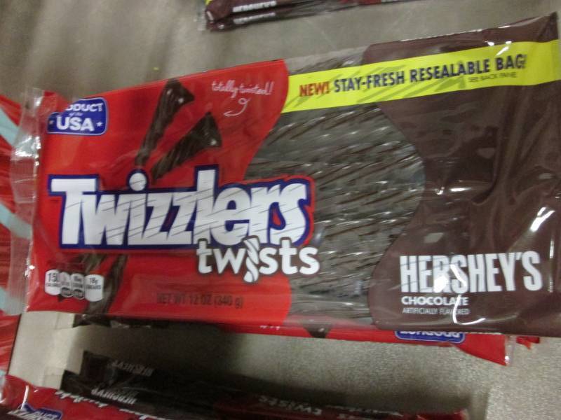 lot 303 image: Lot of 6 Packs Twizzler Twists Hers...