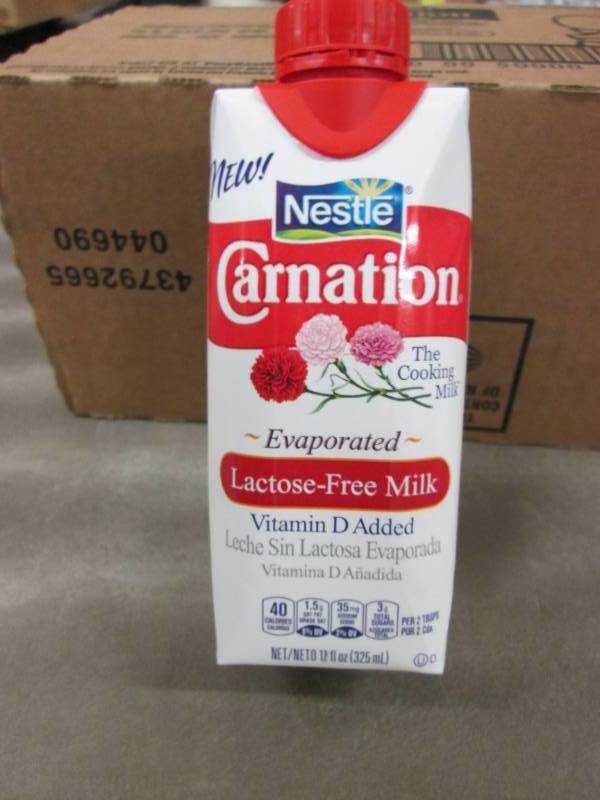 lot 345 image: Case of 11- 8 oz Size Carnation Lac...