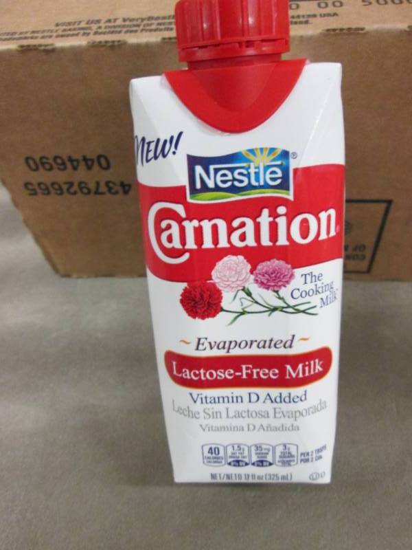 lot 348 image: Case of 11- 8 oz Size Carnation Lac...