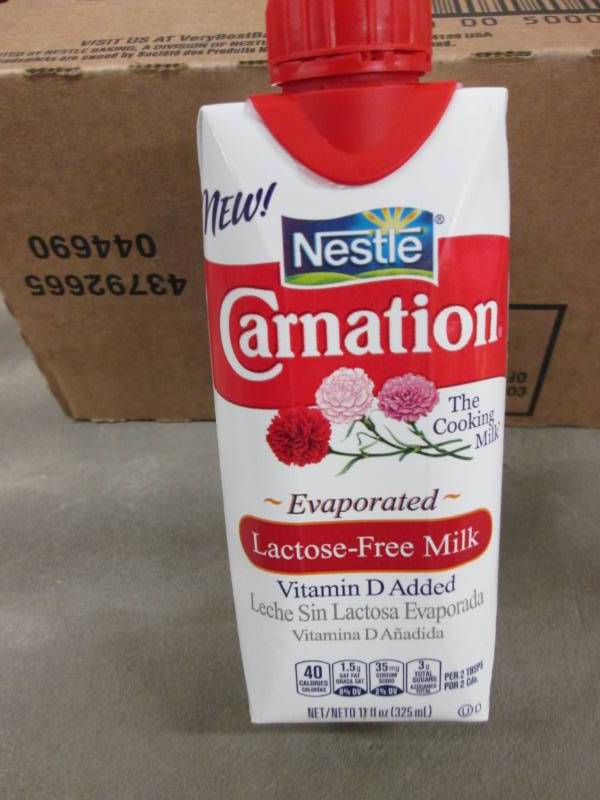 lot 349 image: Case of 11- 8 oz Size Carnation Lac...