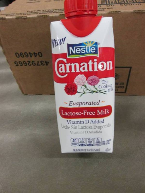 lot 351 image: Case of 11- 8 oz Size Carnation Lac...