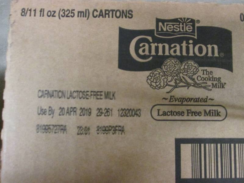 lot 352 image: Case of 11- 8 oz Size Carnation Lac...