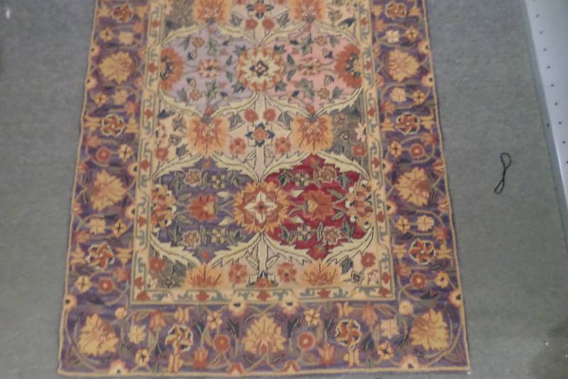 lot 70 image: Rug 57 x 35
