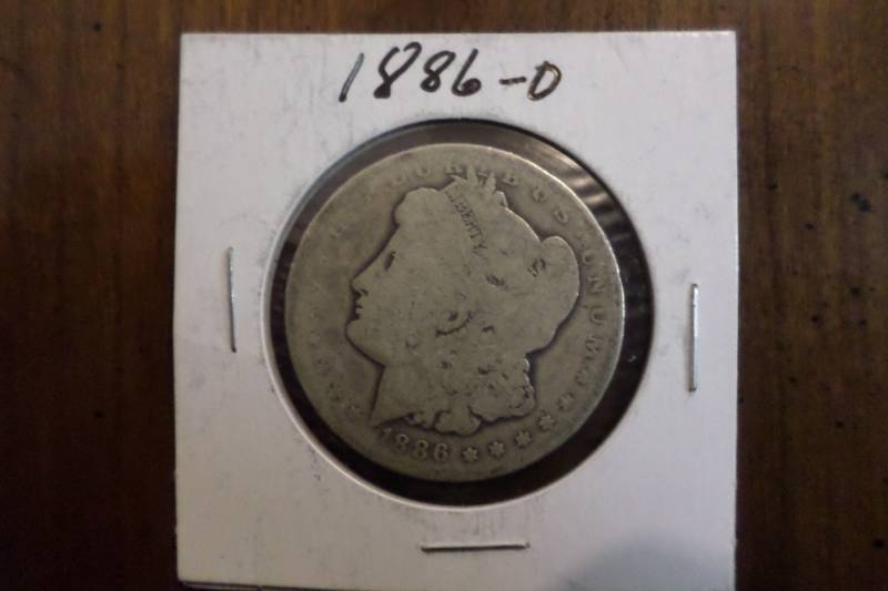 lot 79 image: 1886-O Morgan Silver Dollar