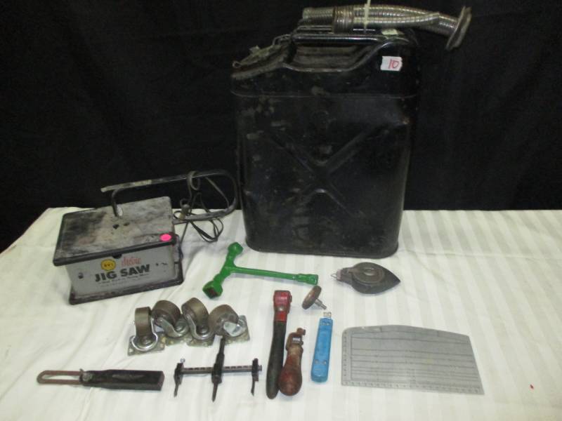 lot 10 image: Old Military Gas Jerry Car Can 2 spouts , John Deere tool, Mini Jigsaw, Set of 4 nice casters and misc tools