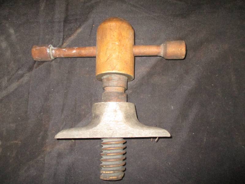 lot 96 image: old wooden vice (part of it)