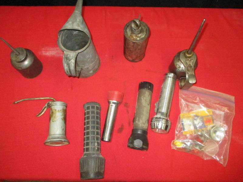 lot 99 image: Oil cans, flashlights
