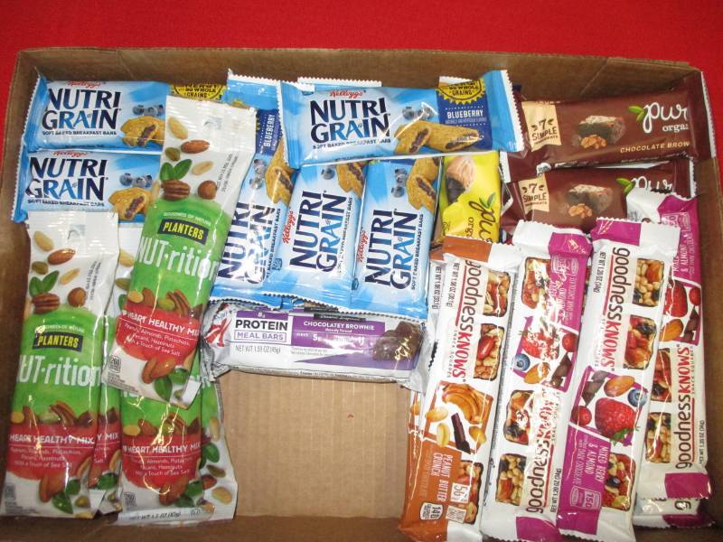 lot 132 image: Breakfast bars and bags of nuts snacks