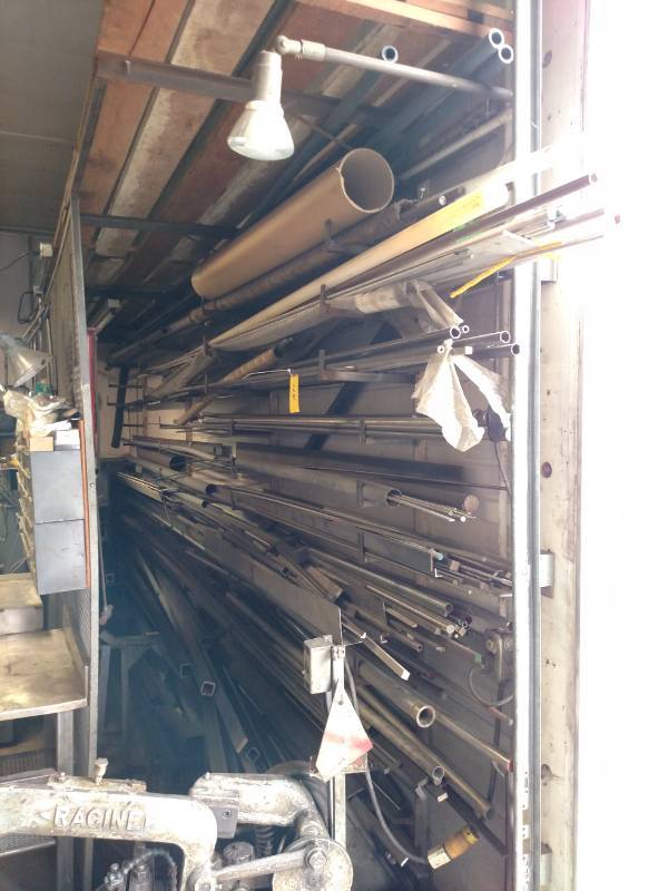 lot 124 image: Asstd Metals Stock on Wall Rack...