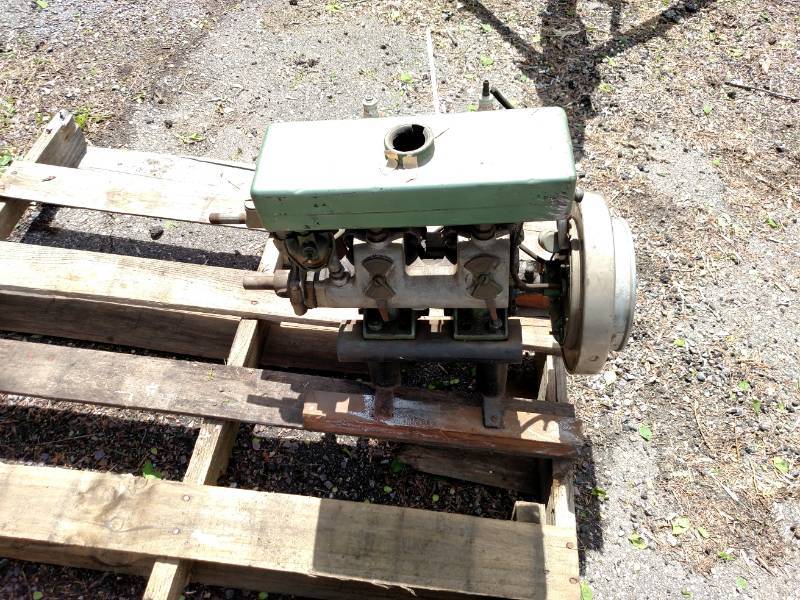 lot 676 image: Early 2 Cylinder Boat Motor, Has Co...