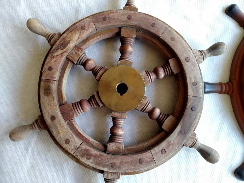 lot 686 image: Wooden Ships Wheel & Poly Ships Whe...