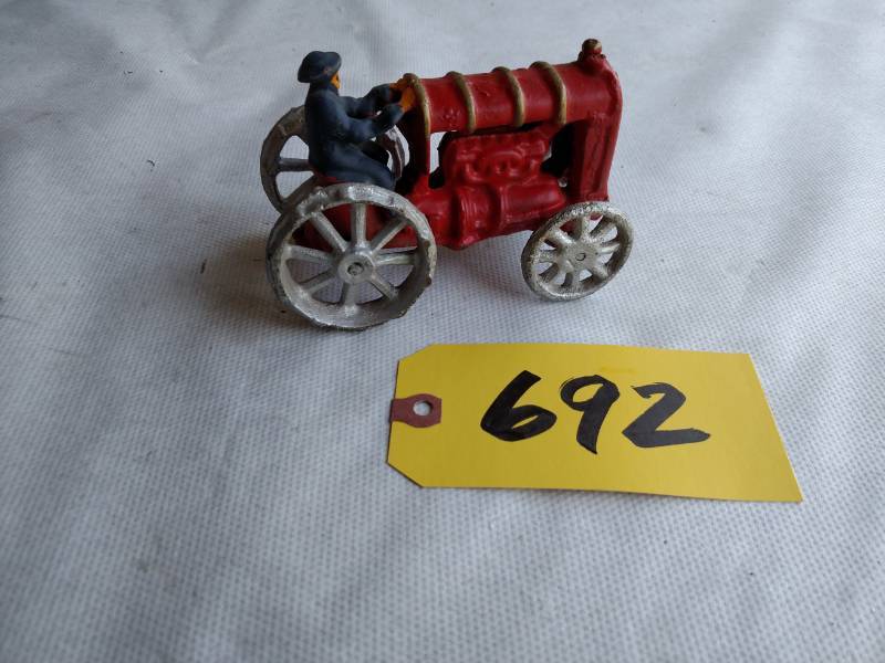lot 692 image: Cast Iron Tractor...