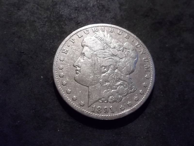 lot 2 image: 1891 CC Morgan Silver Dollar