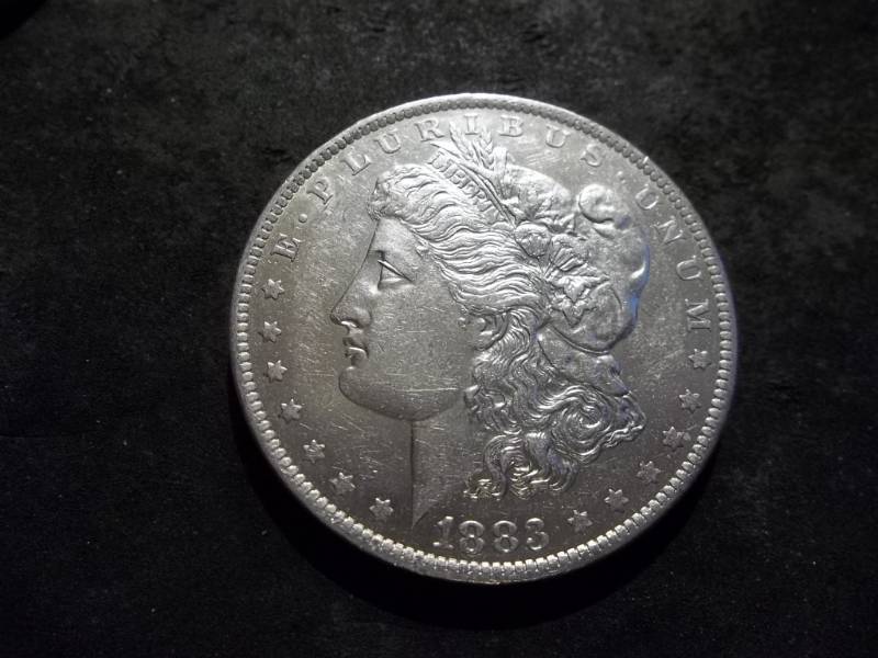 lot 9 image: 1883 O Morgan Silver Dollar