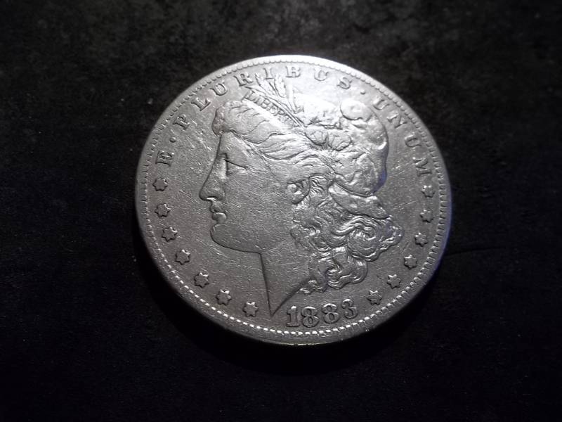lot 10 image: 1883 S Morgan Silver Dollar