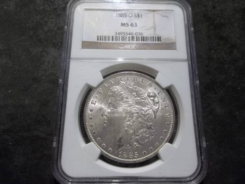 lot 12 image: 1885 O Morgan Silver Dollar