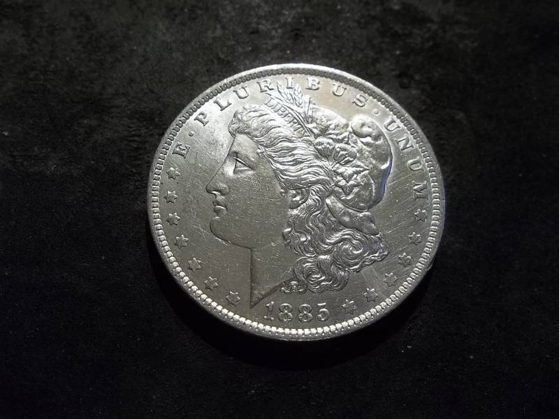 lot 14 image: 1885 O Morgan Silver Dollar