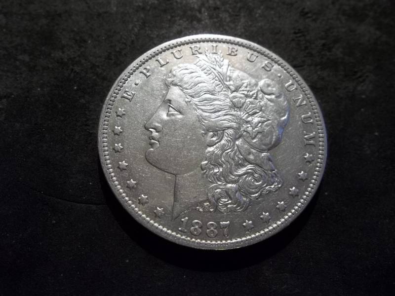 lot 17 image: 1887 O Morgan Silver Dollar