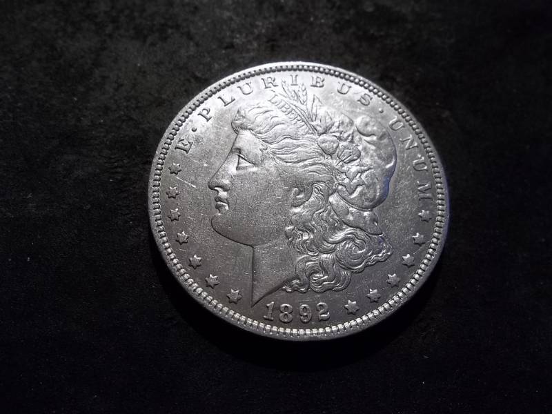 lot 21 image: 1892 O Morgan Silver Dollar