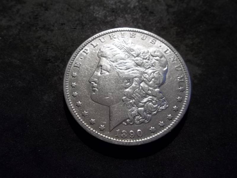 lot 22 image: 1890 O Morgan Silver Dollar
